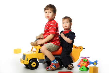 Beautiful child enjoying his game. Shot in a studio. の写真素材