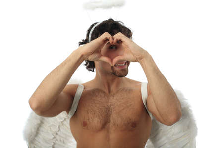 Handsome male angel. Shot in a studio.の写真素材