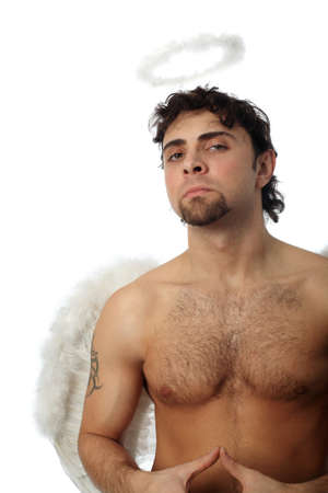 Handsome male angel. Shot in a studio.の写真素材