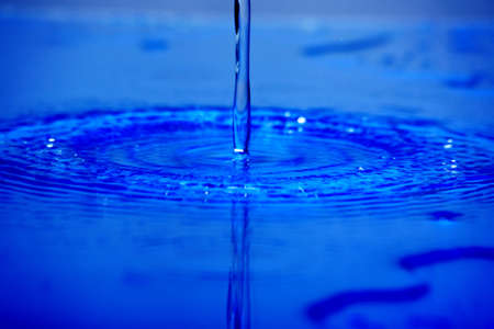 Fantastical water background. Drops, waves, splashes.の写真素材