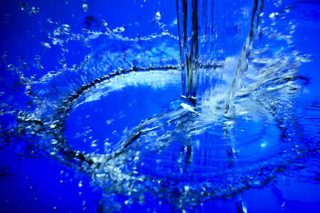 Fantastical water background. Drops, waves, splashes.の写真素材