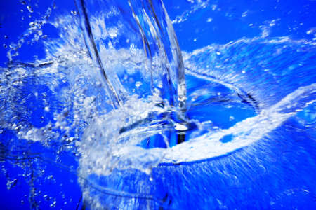 Fantastical water background. Drops, waves, splashes.の写真素材
