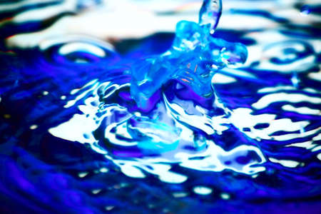Fantastical water background. Drops, waves, splashes.の写真素材