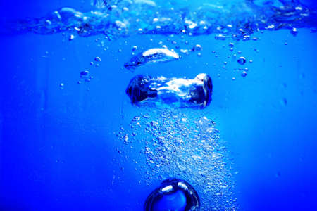 Fantastical water background. Drops, waves, splashes.の写真素材