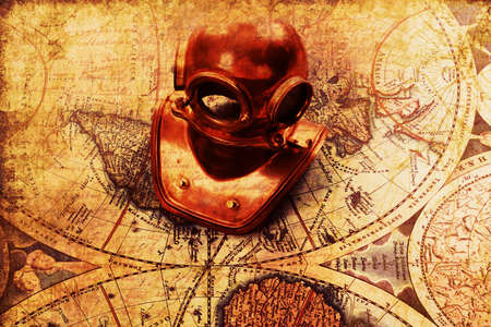 Old fashioned objects on the vintage world mapの写真素材
