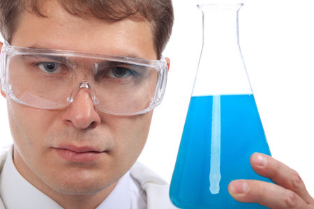 Medical theme: serious doctor working in a laboratory.