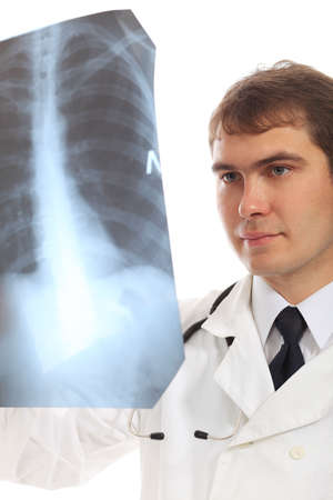 Medical theme: serious doctor holding x-ray.の写真素材