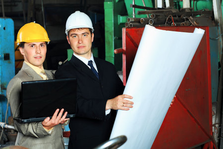 Industrial theme: two blue collars at a manufacturing area.  