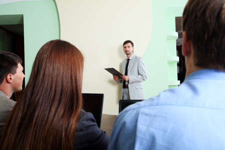 Business theme: business people on a presentation.の写真素材