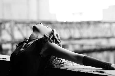 Portrait of a stylish young woman with dreadlocks. の写真素材