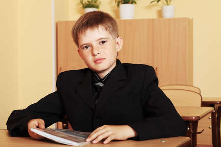 Educational theme: schoolboy in a classroom.の写真素材