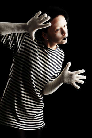 Portrait of a female mime in sailor's striped vest.の写真素材