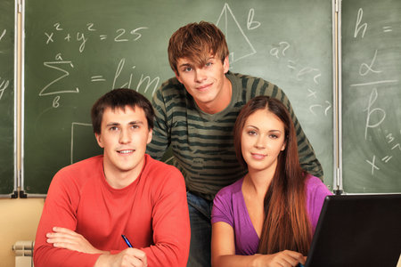 Educational theme: students in a classroom.