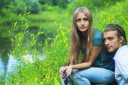 Portrait of a young couple in love outdoor.の写真素材