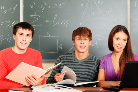 Educational theme: students in a classroom.