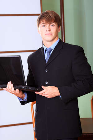Business theme: business man in a work process in office.の写真素材