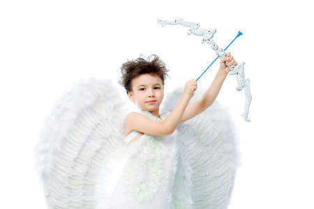 Beautiful little angel at a white background.の写真素材