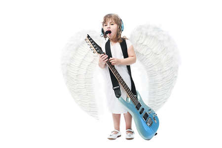 Beautiful little angel with a guitar at a white background.の写真素材