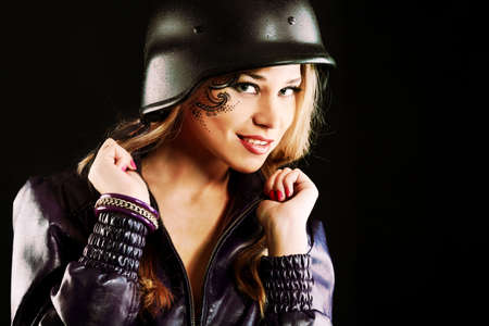 Shot of a beautiful girl holding gun.の写真素材