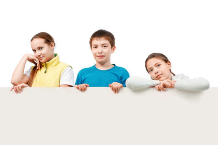 Group of teenagers looking out white board.の写真素材