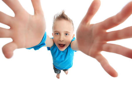 Portrait of a pretty boy. Isolated over white background.の写真素材