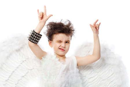Beautiful little angel in rock style at a white background.の写真素材