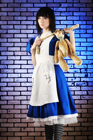 Portrait of a young woman dressed as Alice in Wonderland, video game.のeditorial素材