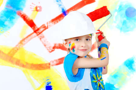 Portrait of a beautiful child enjoying his painting. Education.の写真素材
