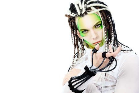 Shot of a futuristic young man with wires. Isolated over white background.の写真素材