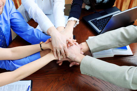 Business theme: hands on top of each other. の写真素材