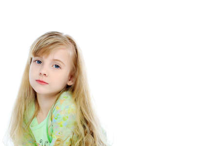 Portrait of a cute 6 years old girl. Isolated over white background. の写真素材