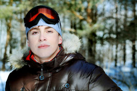 Portrait of a handsome man outdoor in winter.の写真素材