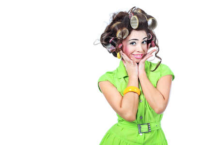 Shot of a funny  woman housewife dressed in retro style. の写真素材