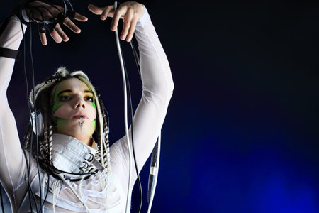 Shot of a futuristic young man with wires.