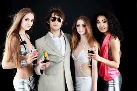 Group of a stylish young people. Fashion, beauty, entertainment.の写真素材