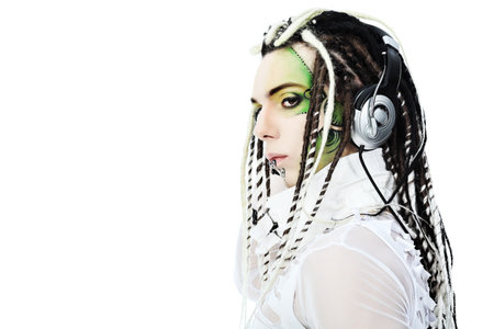 Shot of a futuristic young man in earphones. Isolated over white background.
