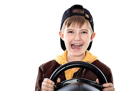 Portrait of a boy teenager playing with television-game device. Isolated over white background.の写真素材