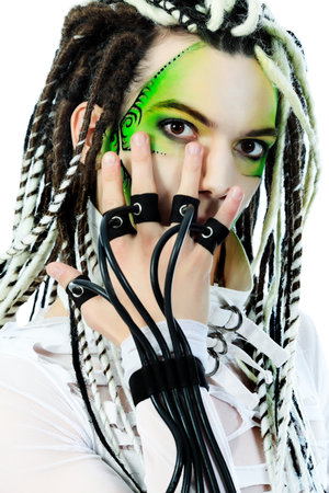Shot of a futuristic young man with wires. Isolated over white background.の写真素材