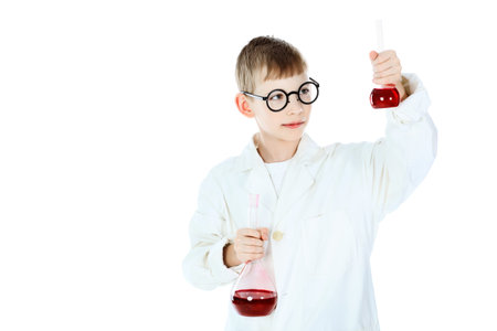 Shot of a little boy in a doctors uniform. Isolated over white background.