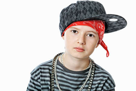 Shot of a trendy teenager posing over white background.の写真素材