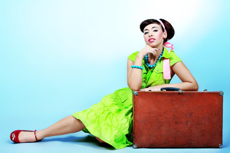 Portrait of a beautiful young woman in retro style. 
