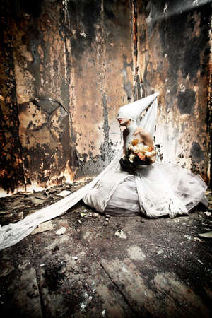 Shot of a twilight girl in white dress. Halloween, horror.の写真素材