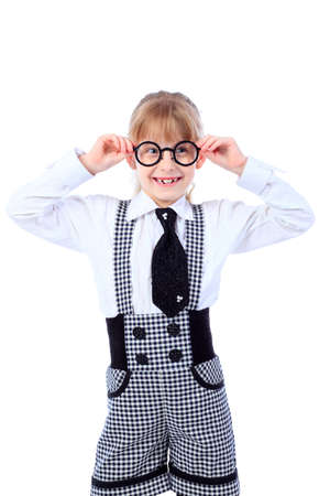 Shot of a little girl in glasses. Isolated over white background.の写真素材
