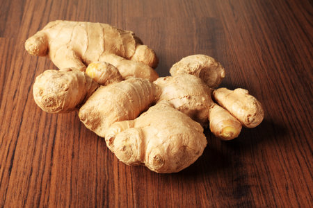 Close-up of a ginger root on a table.