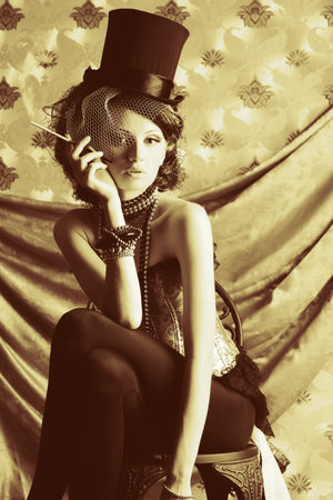 Portrait of a fashionable lady over vintage background.