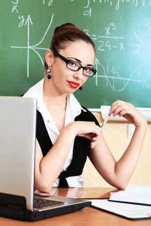 Educational theme: college teacher giving a lecture to students.の写真素材