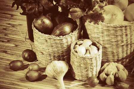 Rural composition with fresh greens, garlic and onionsの写真素材