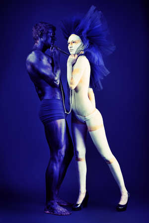 Passionate couple with bodies painted in white and black colors. Body painting project. の写真素材