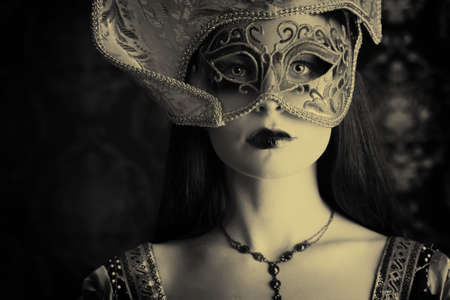 Portrait of a beautiful woman in medieval era dress. Shot in a studio.の写真素材