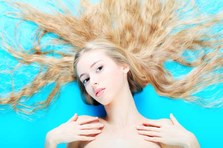 Portrait of a beautiful  professional model. Theme: healthcare, beauty, fashionの写真素材